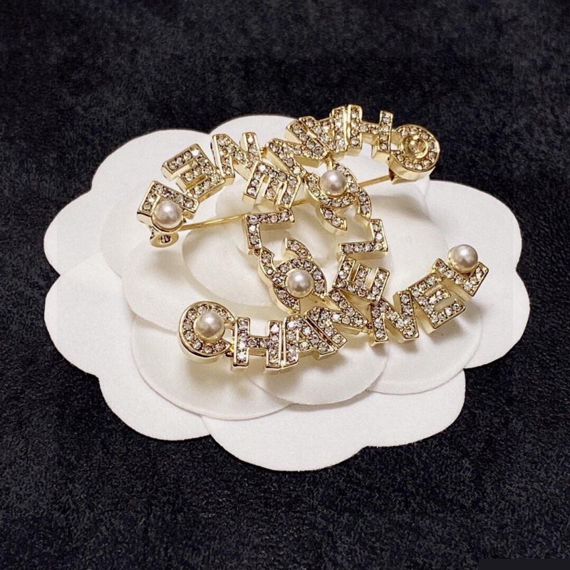 Ch*el brooches